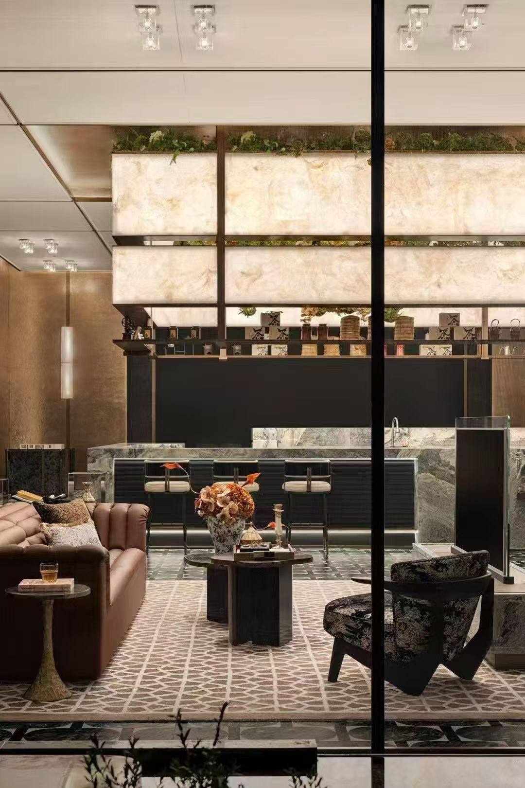 Custom backlit alabaster panels in a bar lounge by ETERNAL