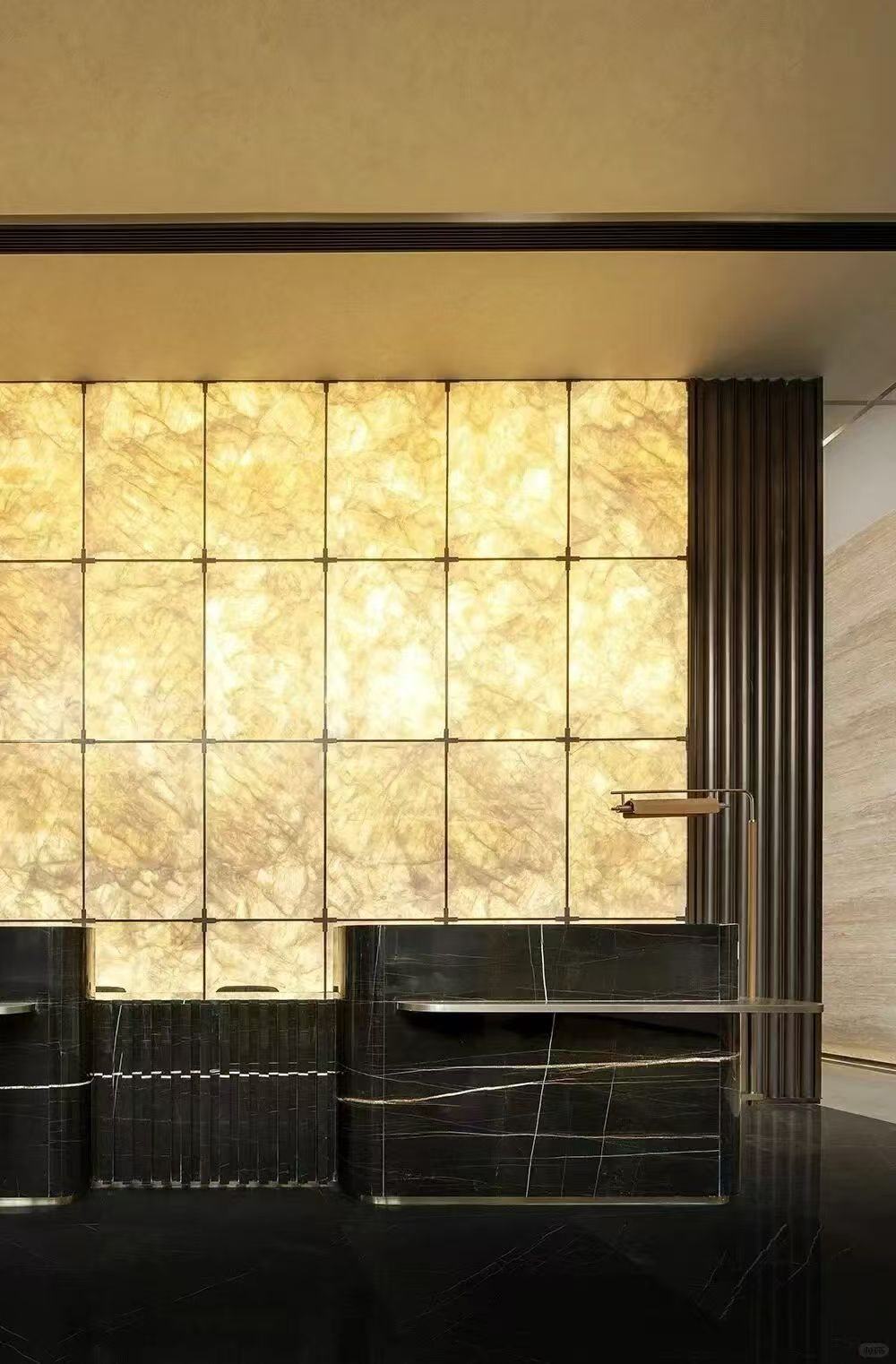 Custom backlit faux alabaster panel reception wall by ETERNAL