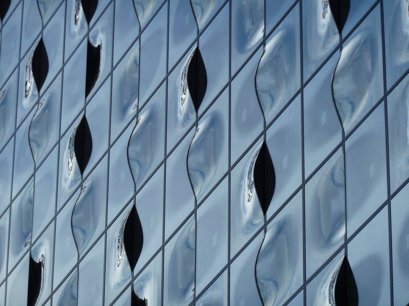Curved glass facade panel detail in modern architecture