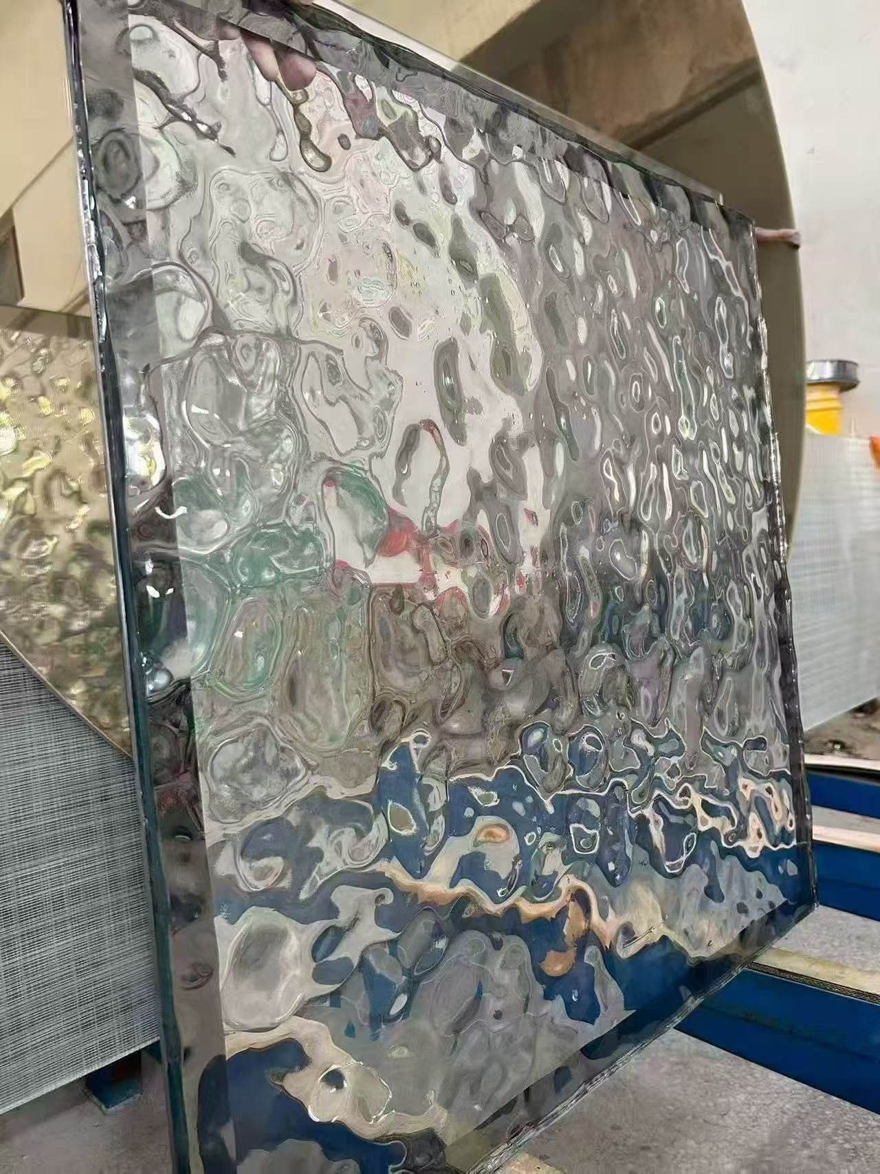 Close-up of fused textured glass surface with flowing 3D patterns