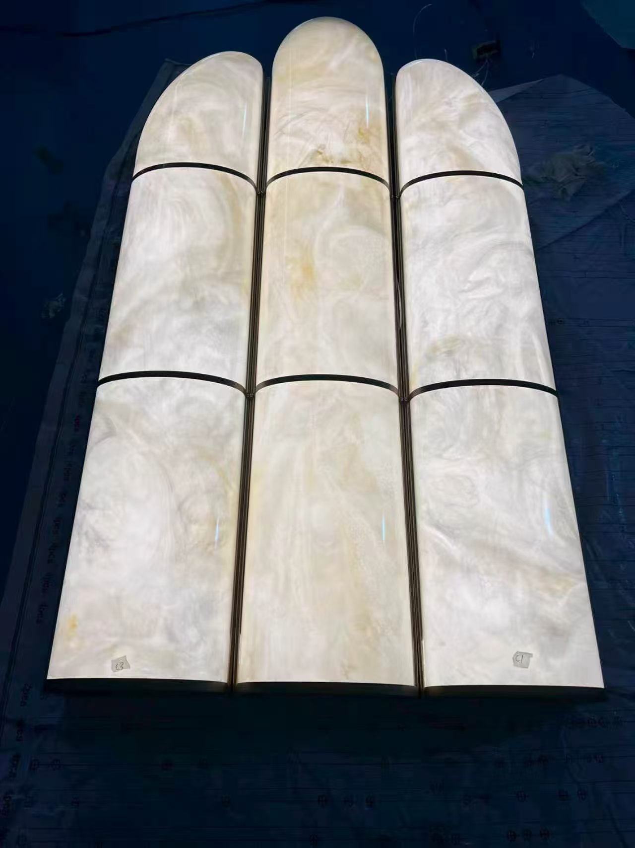 Curved faux alabaster columns — Luxury Hotel · Translucent Faux Alabaster Panel Lobby Project by ETERNAL
