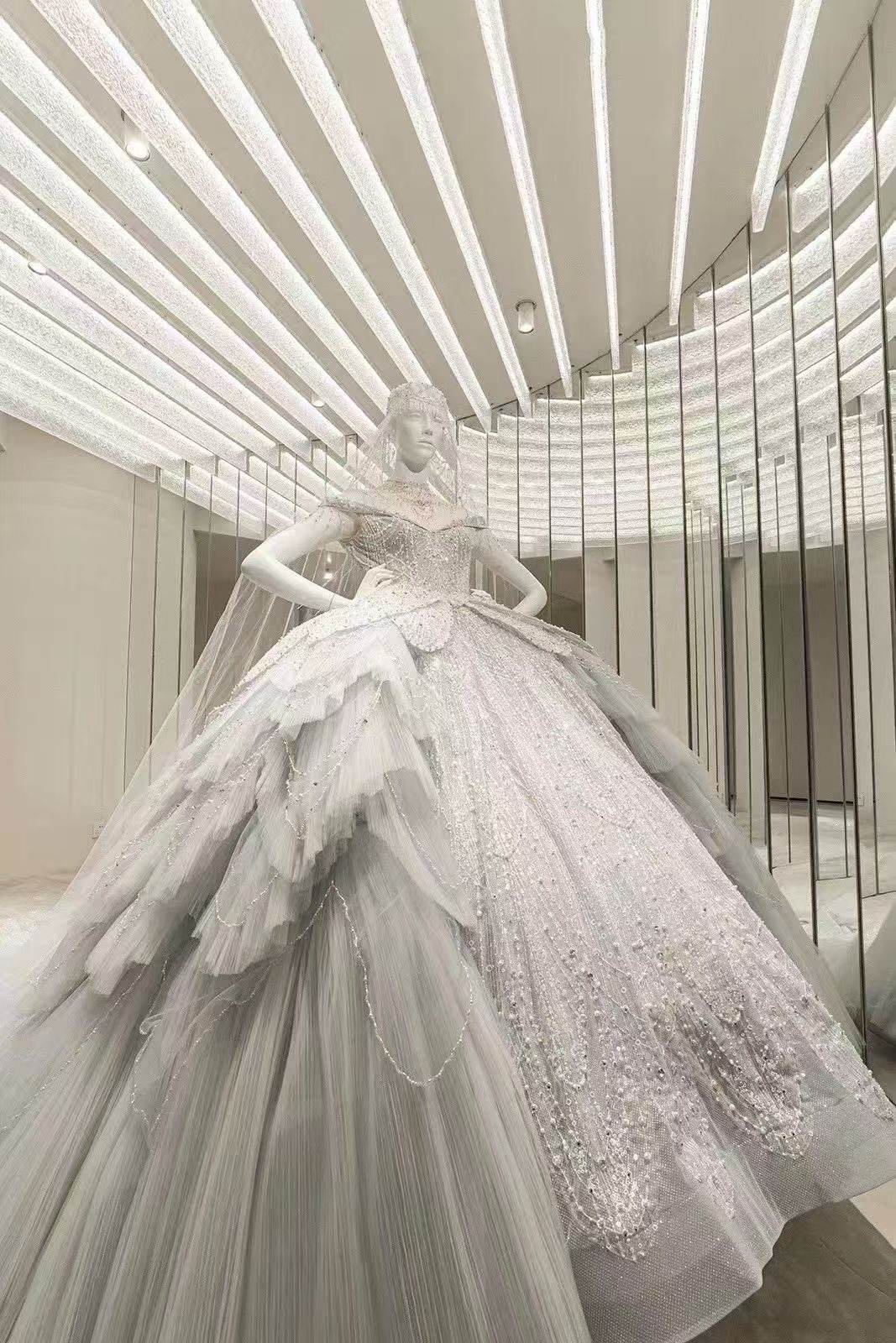 Gown behind fluted glass — Bridal Boutique · Curved Textured Glass Project by ETERNAL