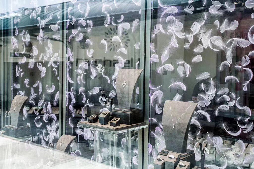 Feather pattern glass in the display area — Brand Showroom · Feather Pattern Art Glass Wall Project by ETERNAL