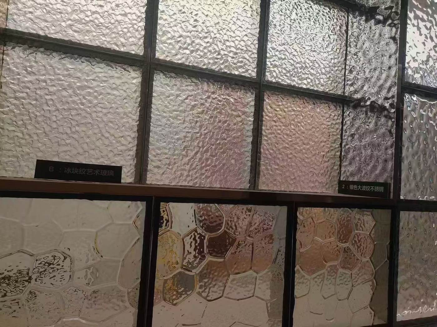 Fused textured glass partition wall in a premium clubhouse by ETERNAL
