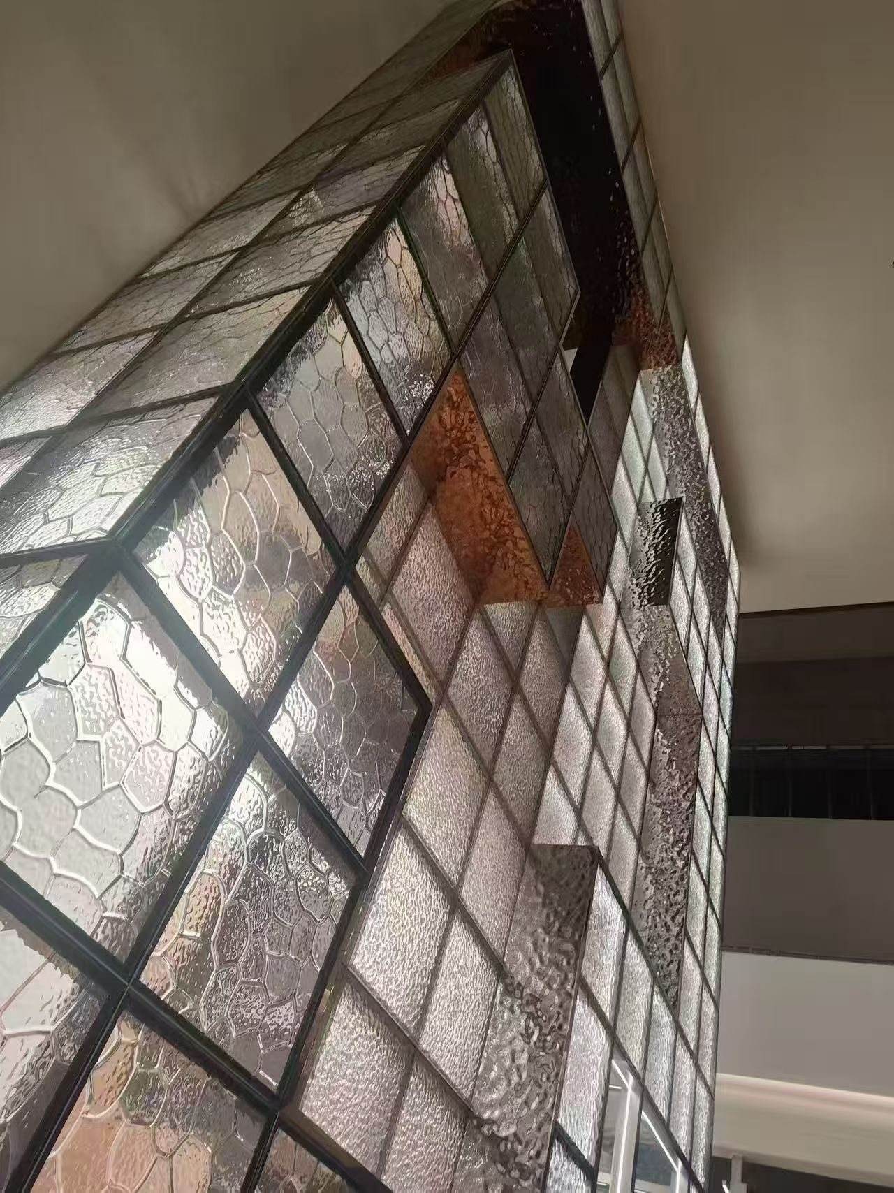 Side view of the fused glass screen — Premium Clubhouse · Fused Textured Glass Screen Project by ETERNAL