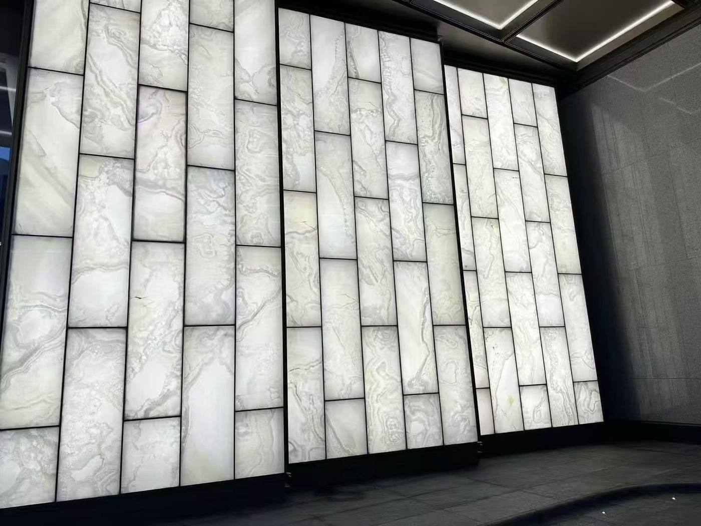 Close-up of the faux alabaster veining — Luxury Hotel · Translucent Faux Alabaster Panel Lobby Project by ETERNAL